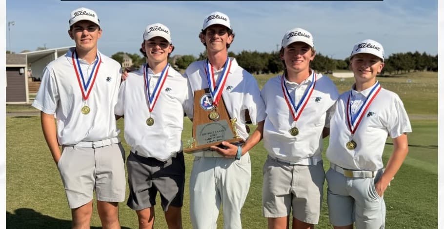 The boys' varsity five with the District 9-4A championship trophy